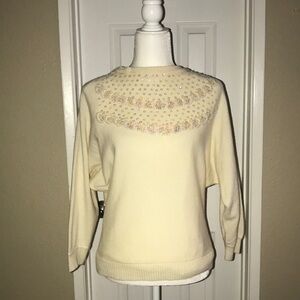 Elegant Cream Sweater with Embellished Neckline